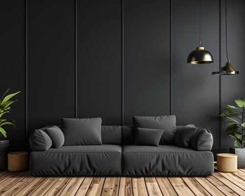 A minimalist black interior with a black sofa
